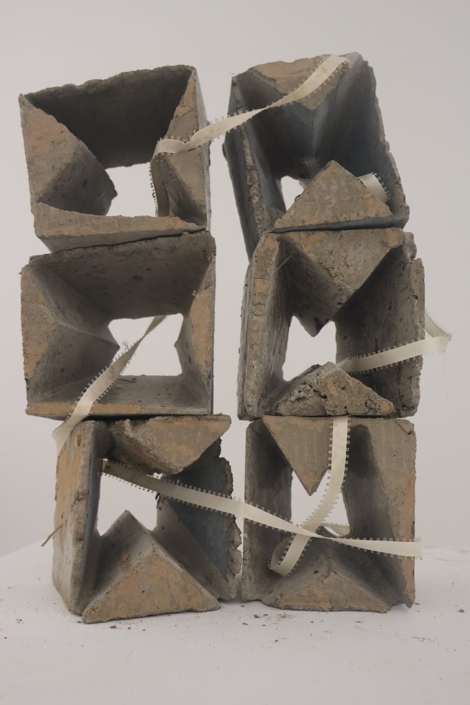 Concrete and Ribbon, 6 5’’x5’’ cubes stacked many different ways